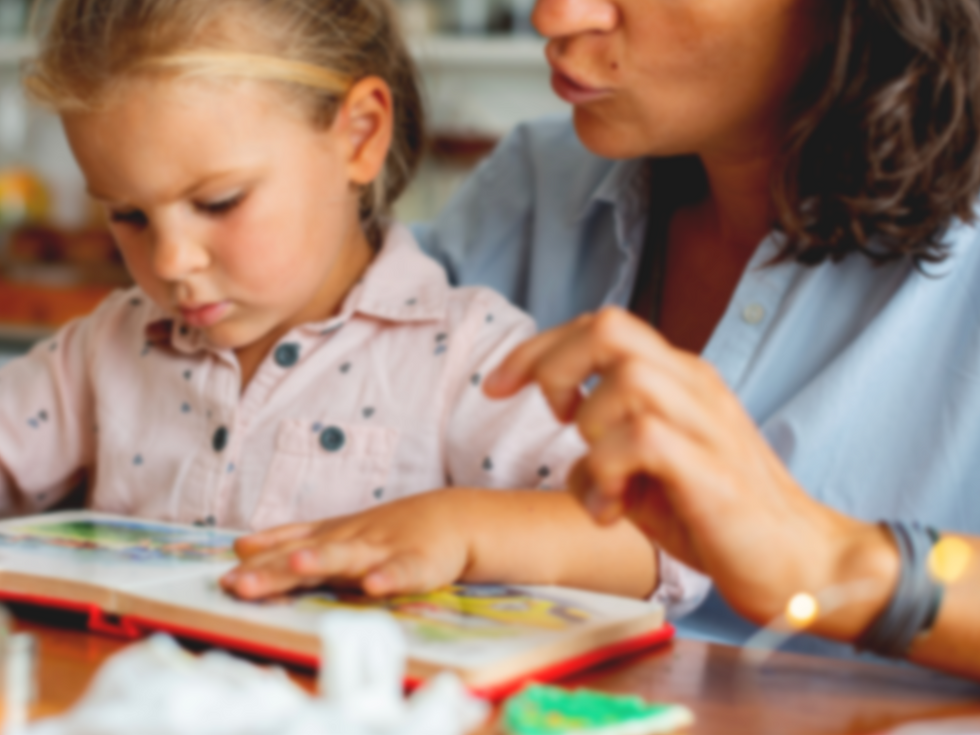 Mom and son reading picture book