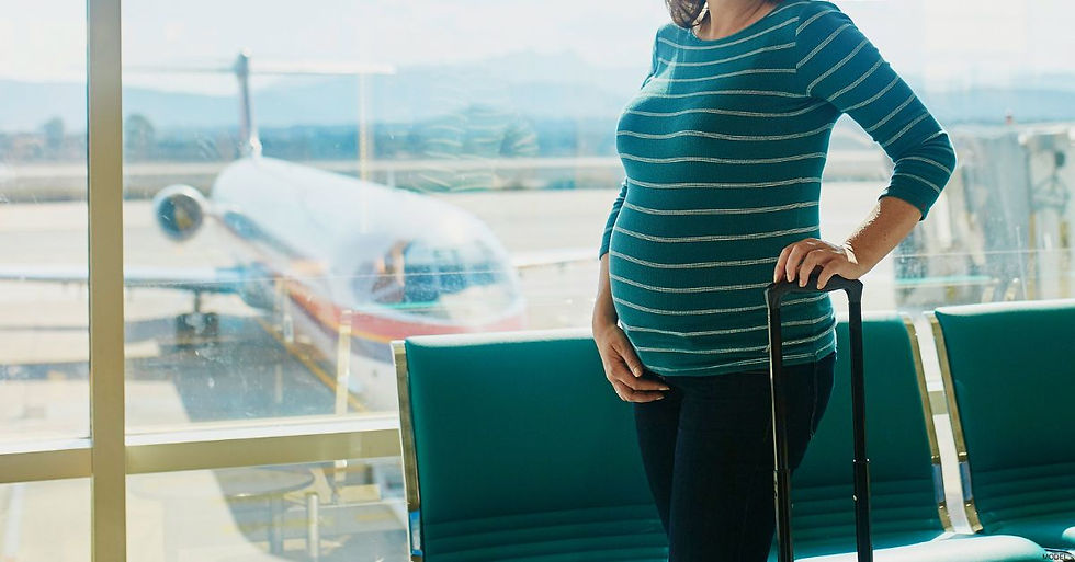 Pregnant woman standing in an airport (model) Source: Getty Images. Credit: encrier